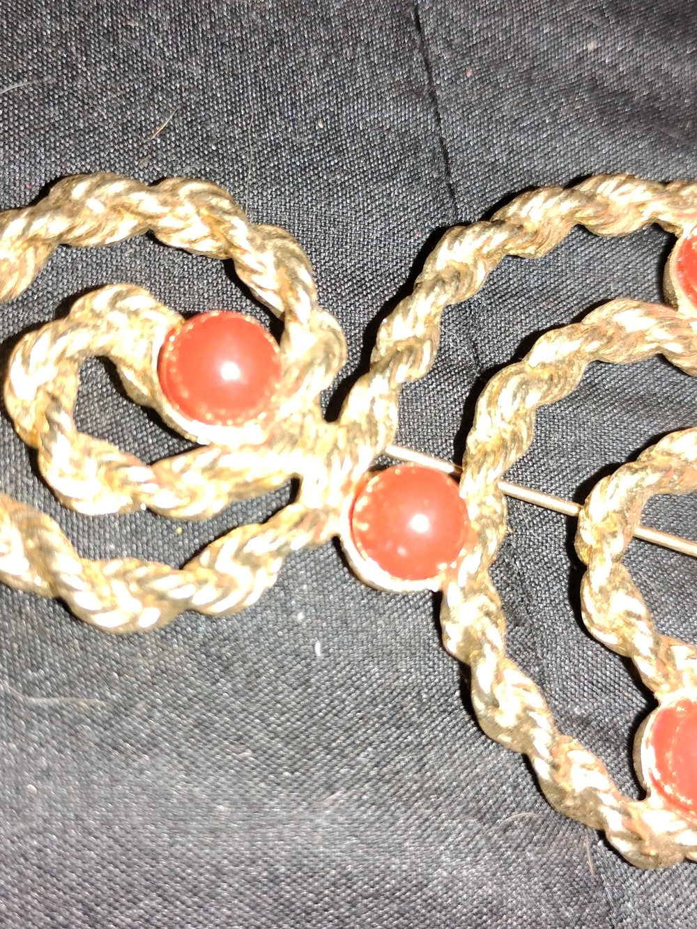 Gold-Tone Rope Brooch with Red Cabochon Accents